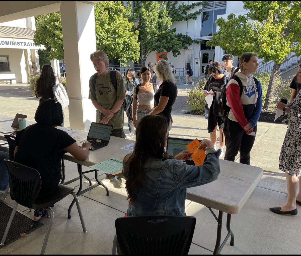 Students request schedule changes in front of the counseling office during school hours. 