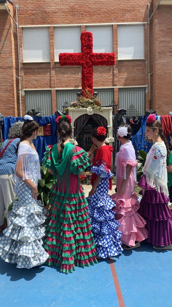 Manuela Galvez Molina, right, celebrates “Día de la Cruz,” or “Day of the Cross,” a festival in Andalusia, Spain.