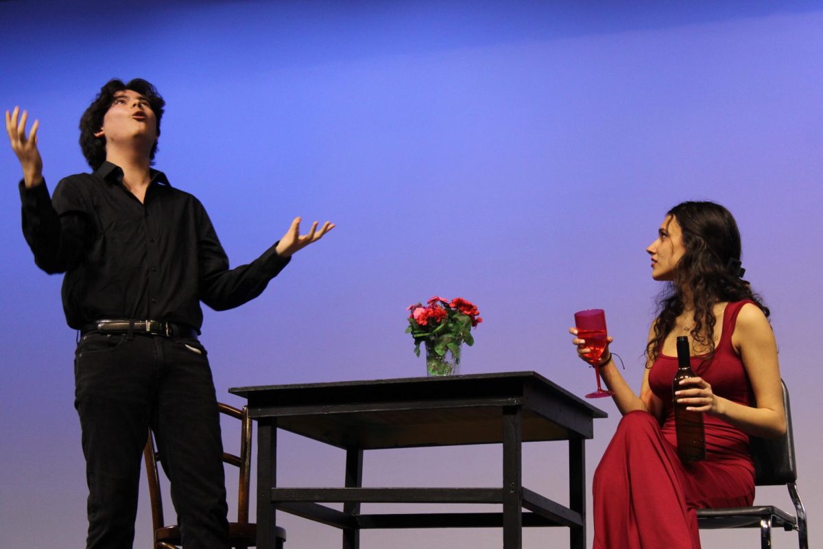 Seniors Maverick Smith (left) and Nadia Rouillard played Lev and Amara, respectively, in a vignette about a couple arguing on their anniversary. Storylines such as these were featured in the drama performance, “Remedies for a Broken Heart”. 