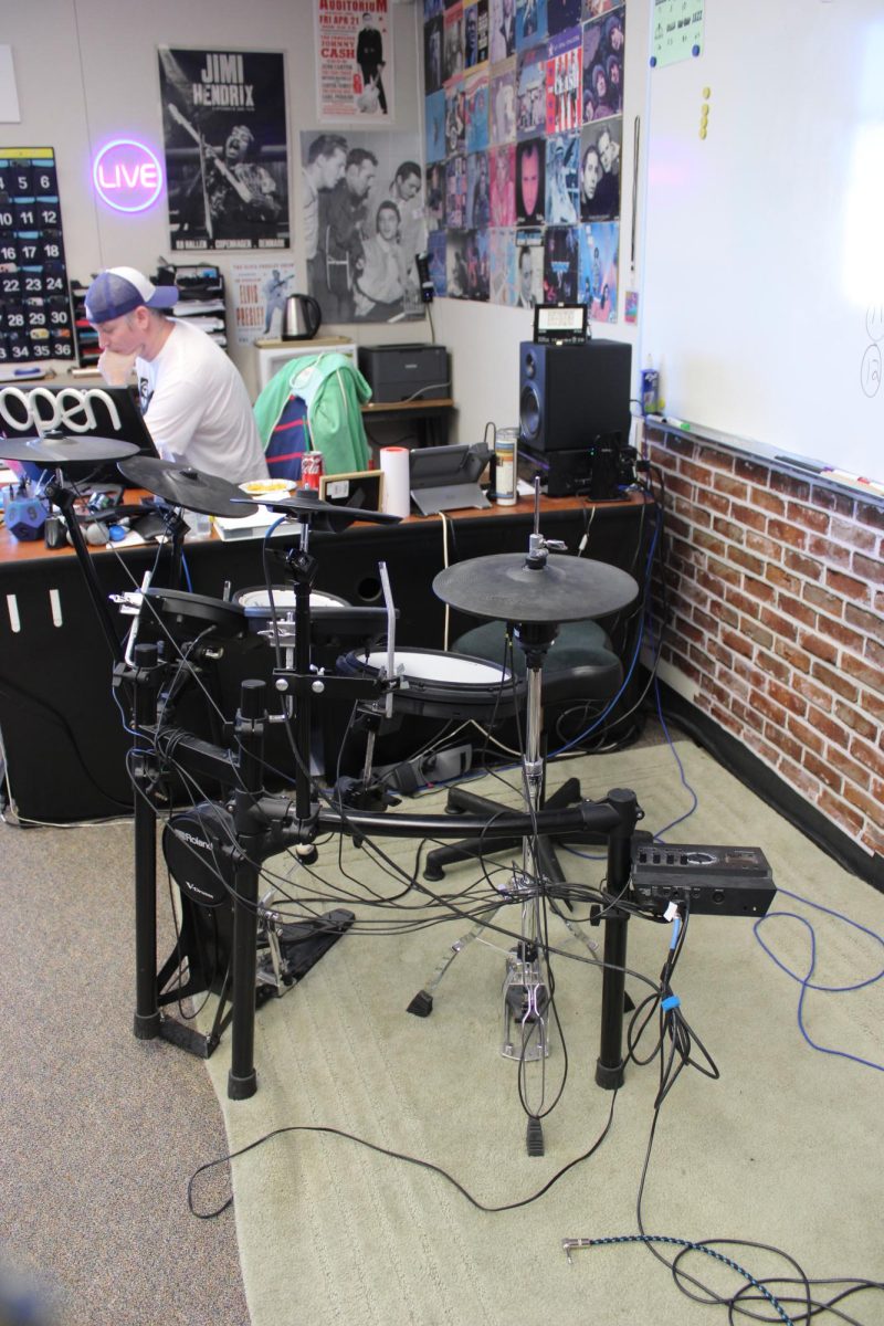 Brandon Andrews keeps a drumset in his room for his band.