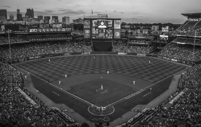 Spectators watch a Braves game at Truist Park in Atlanta. The MLB season opens today. 