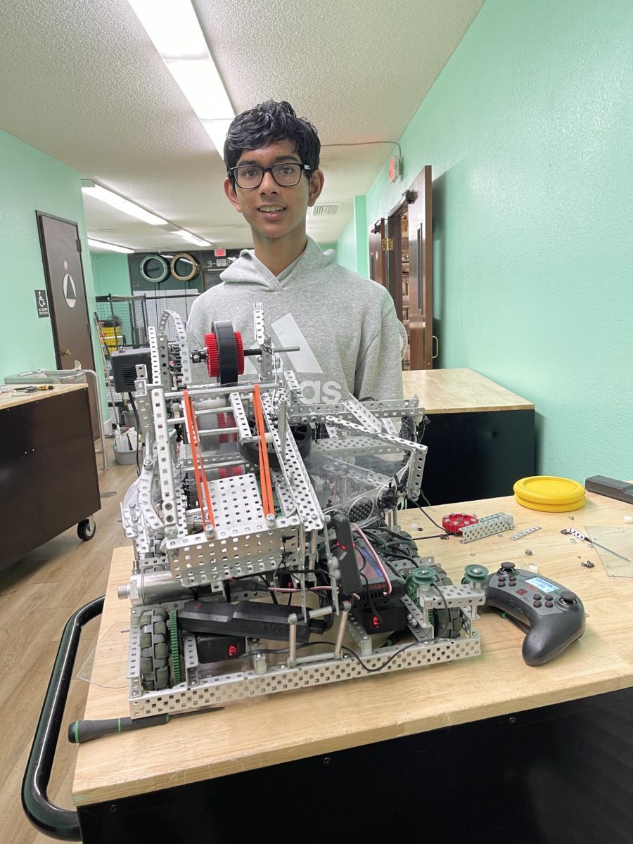 Junior Sayansh Gupta presents the VEX robot he built with his team for a robotics competition. He has attended many in the past, including the Maine Lobstah Bowl Signature Event.