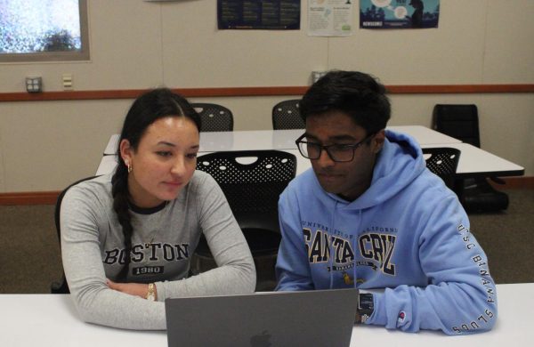 Juniors Kai Licata, left, and Aritro Bhatacharjee plan their next visit to Country Club Elementary School with the Teaching Tech Club, which involves elementary school students in STEM activities so that they can explore from a young age.