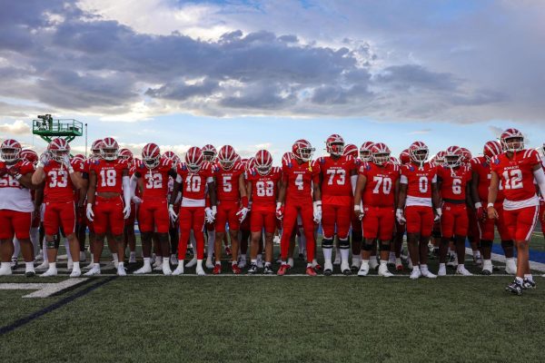 The Mater Dei football team poses in their stadium, which costs nearly $20 million to build. The Santa Ana team is the top-ranked high school football team in the country. 