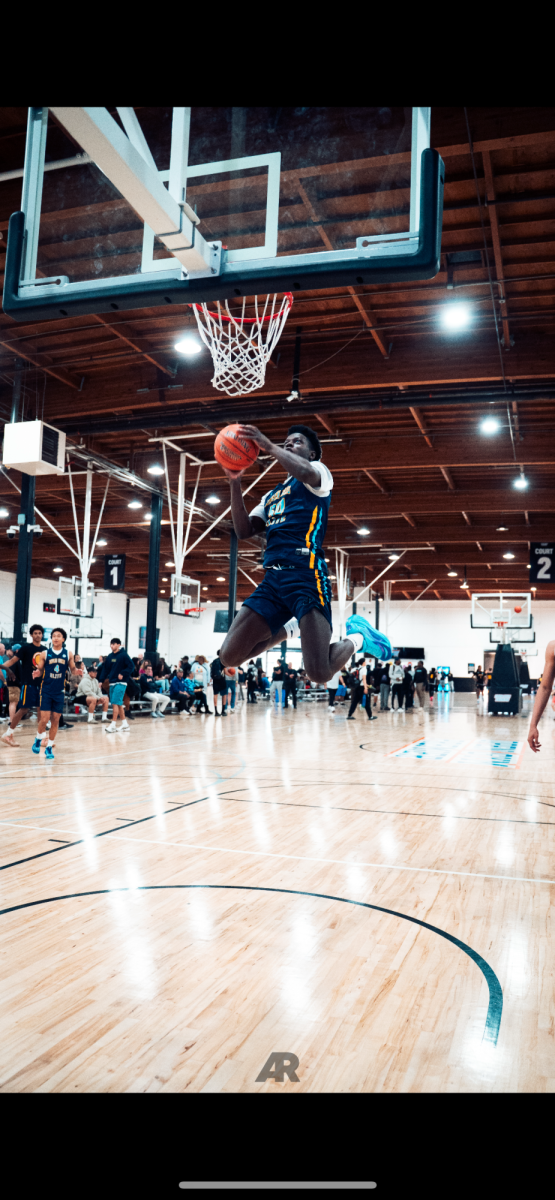 Cal High junior Juremi Ejuwa soars for a basket while competing for the Jaylen Wells Elite team on April 5.