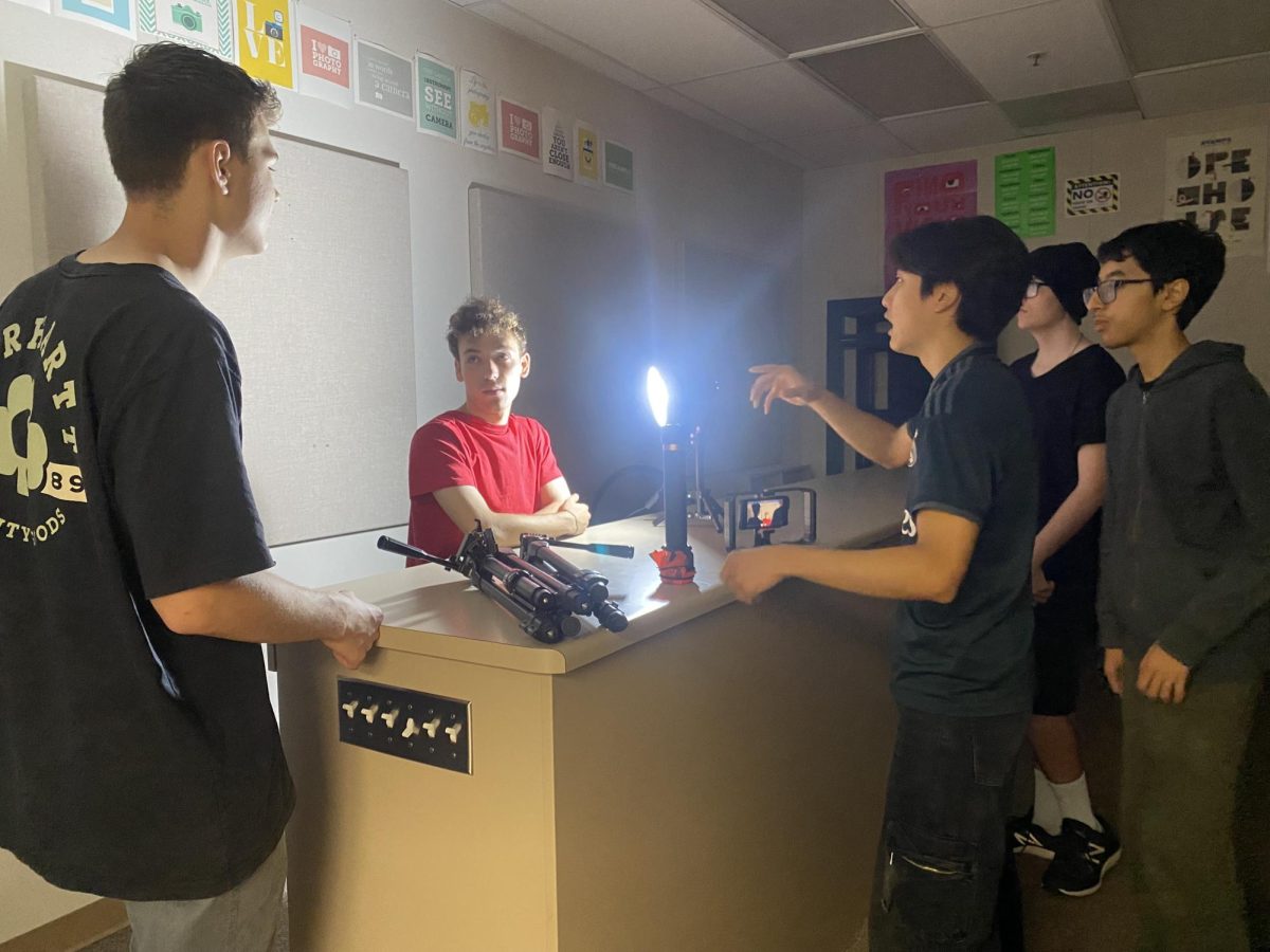 Cal High’s new video production class works on making a movie with low light and collaborating to record each other. 