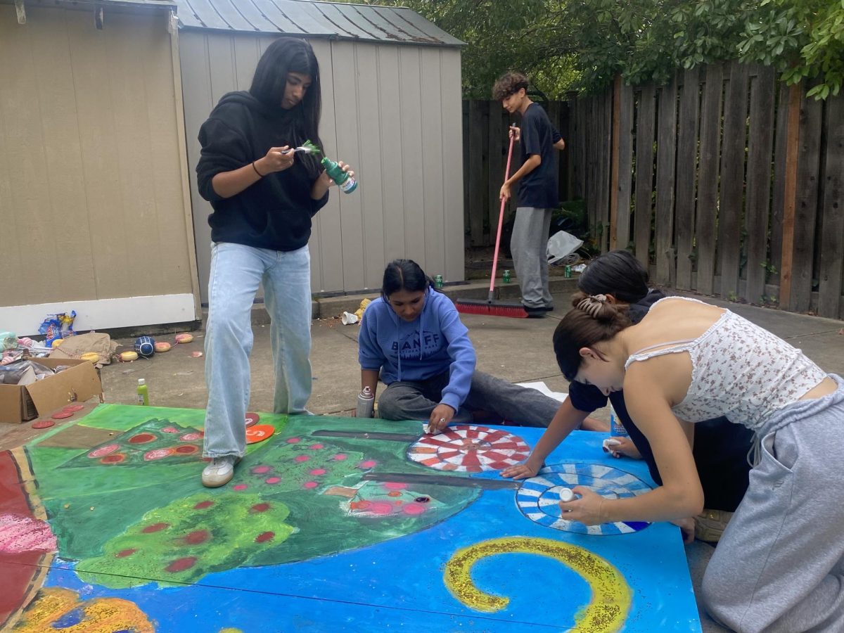 Freshman work on the float which reflected the film "Charlie and the Chocolate Factory". Cal's homecoming theme of "At the Movie" was on full display during the parade of Oct. 2. 