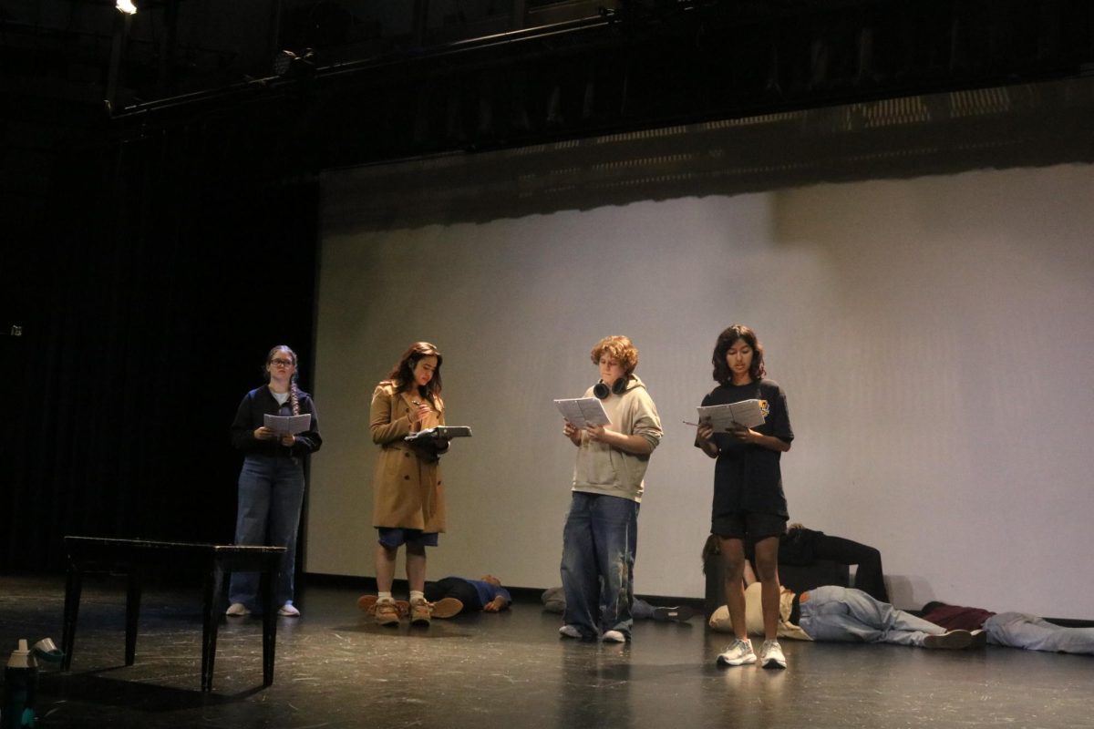From left to right, junior Talia Campbell and seniors Malakai Sokolova and Gia Bhatt rehearse for their upcoming play, “Trap”, which is the theater class's first performance of the year.  The play tells a story about a mystery taking place in a small California town and will be performed at the Cal High Theatre from Oct. 29-30 at 7 p.m.