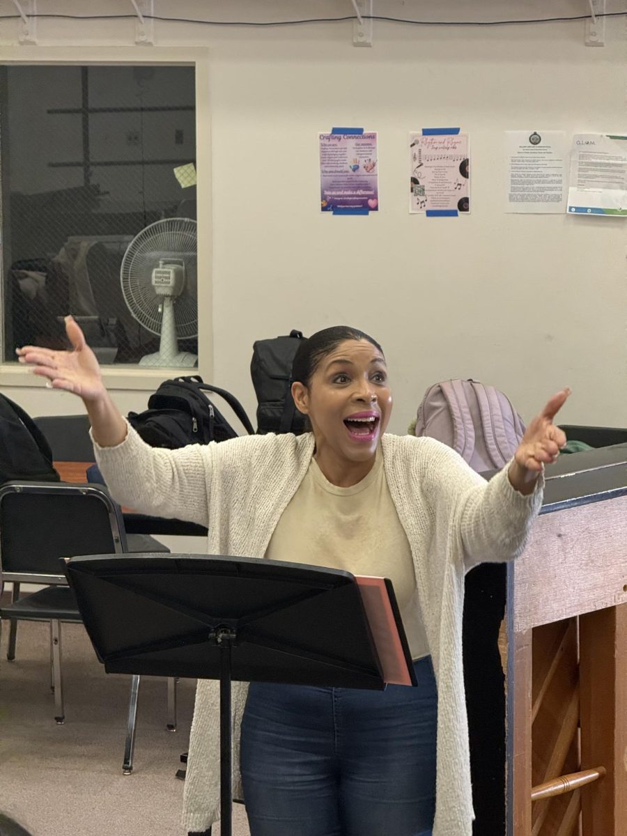 Cal High choir and orchestra teacher Lori Willis directs her chamber singers as they practice for the upcoming fall concert. She has used her prior training from UC Berkeley’s music program to teach her students at Cal since.