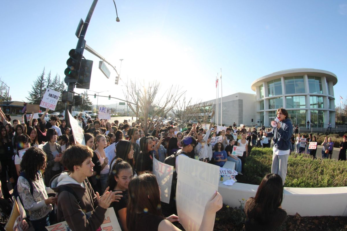 California High School 12th grader Benjamin Barba Zuniga speaks to the crowd of students speaking out against U.S. Immigration and Customs Enforcement in front of City Hall in San Ramon, Calif., on Feb. 6, 2026.
