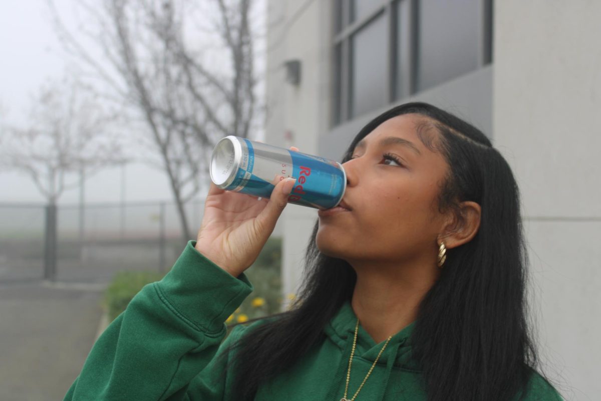 Freshman A’dore Stephenson drinks a Red Bull energy drink, which are incredibly popular among sleep deprived Cal High students.  But should teenagers be drinking them?