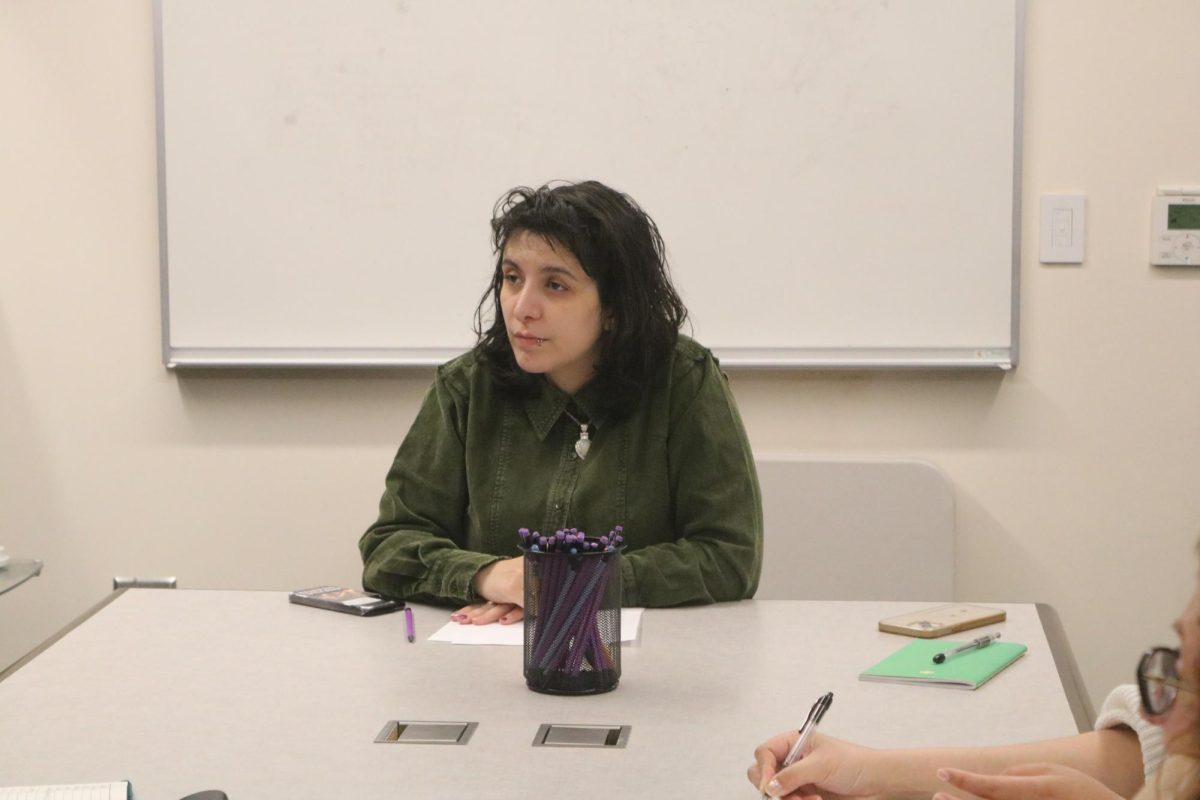 Cal High alumna Jaz Sufi listening to a student during one of her poetry workshops. She has been serving as San Ramon’s Poet Laureate since October 2024.