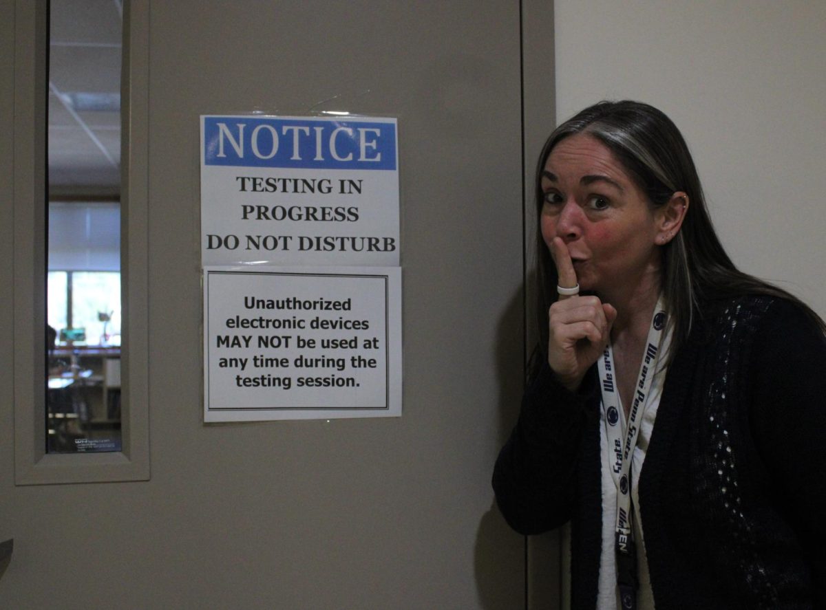 Assistant principal Kristine Sexton shushes students passing by a classroom while students are taking the CAASPP test.  Cal High administered the CAASPP test over the course of six days in early March. Juniors are tested each day, while seniors tested only two days.