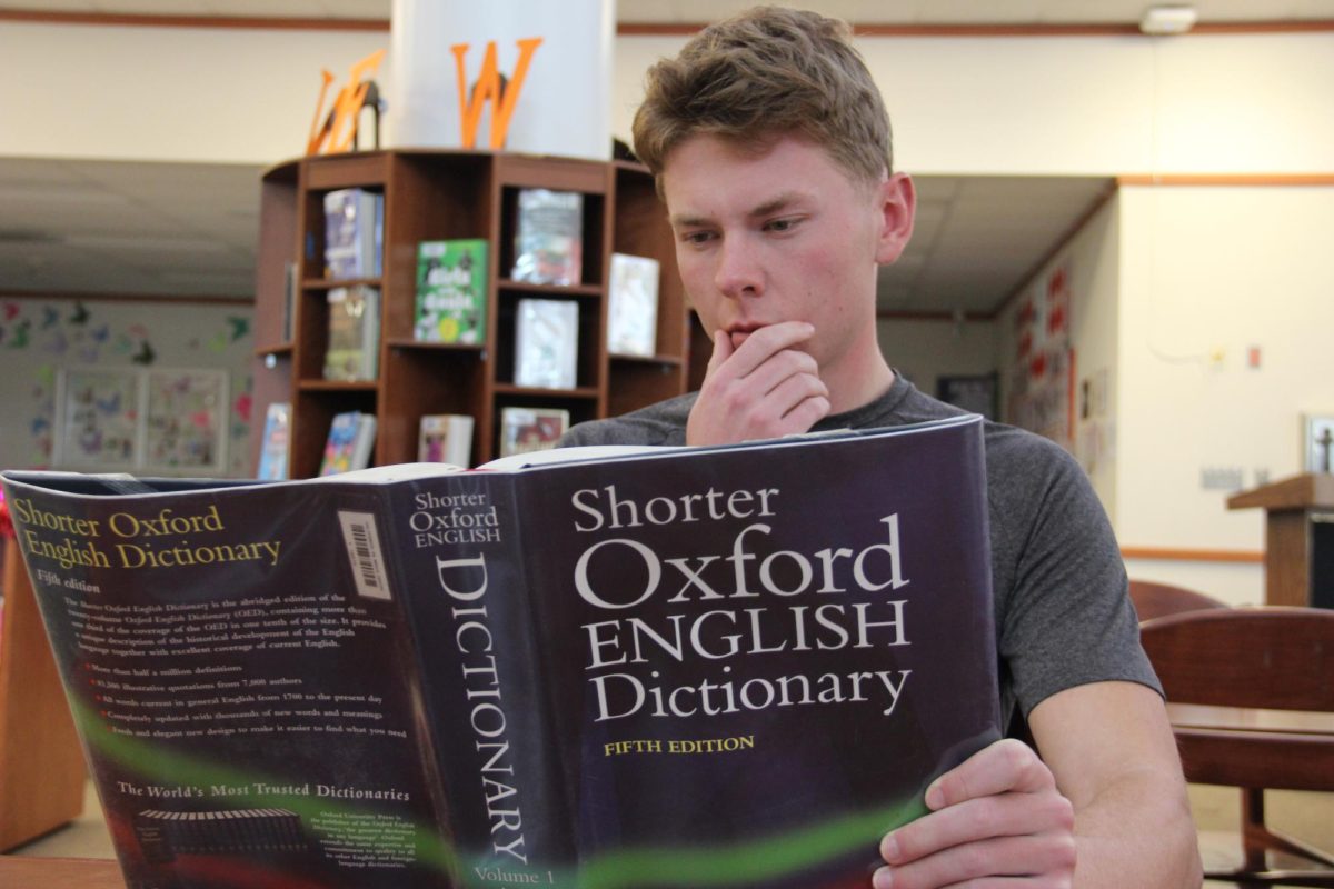 Senior Alex Reid ponders the advice he will give others and does his best to prepare logical answers for Cal High students’ insightful, philosophical questions.