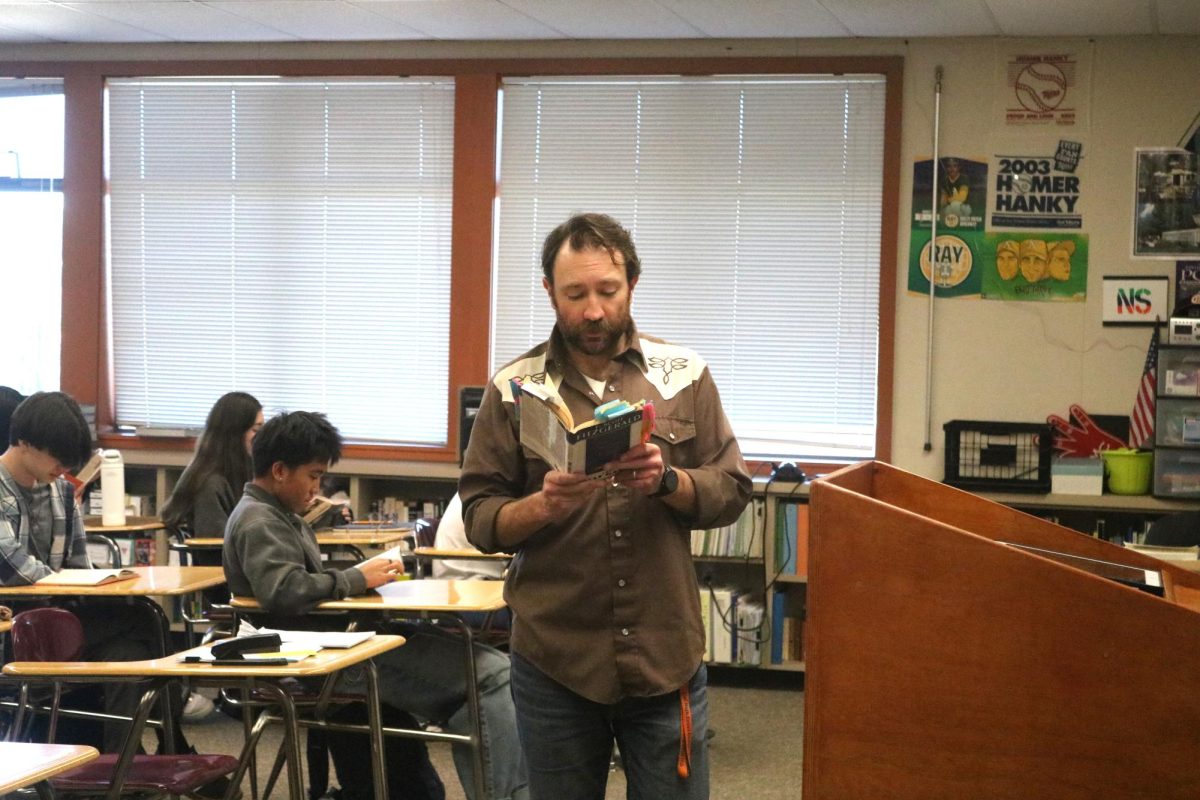 English teacher Nicholas Shea reads “The Great Gatsby” aloud with his English 11 students. F. Scott Fitzgerald’s classic about the 1920s is among the books that made an impression on staff writer Josh DiGiovanni.